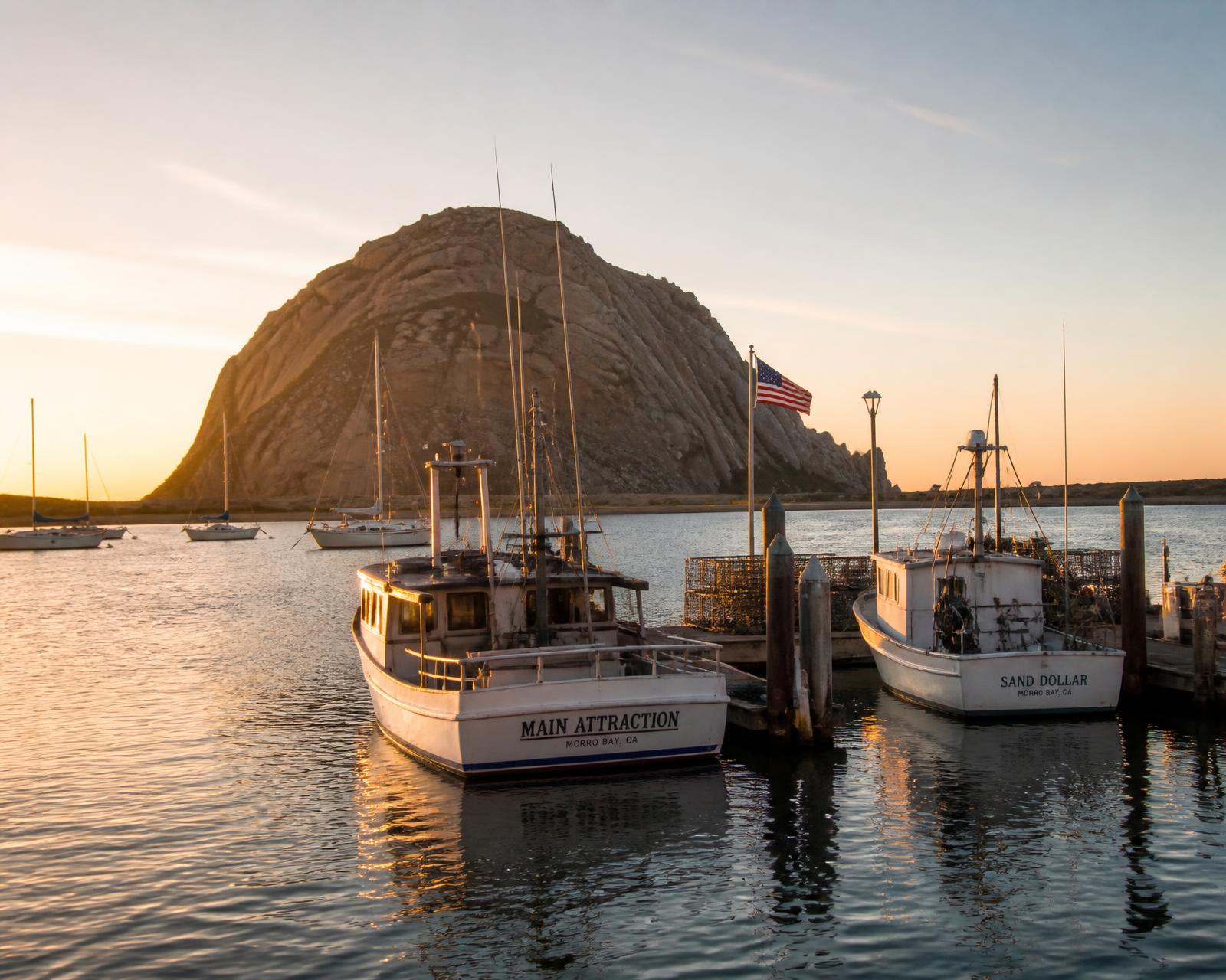 Morro Rock and Morro Bay harbor at golden hour on California's Central Coast
